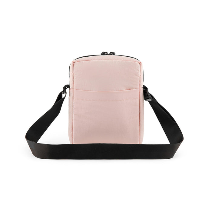 THE NORTH FACE® TNF CITY VOYAGER CROSS BODY EVENING SAND PINK/TNF BLACK
